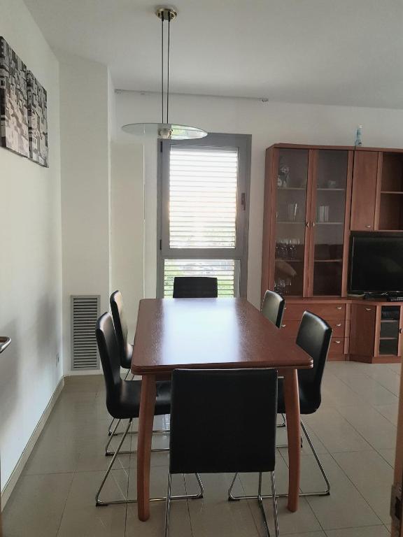 Televízia a/alebo spoločenská miestnosť v ubytovaní Europa - Fira Barcelona Apartment
