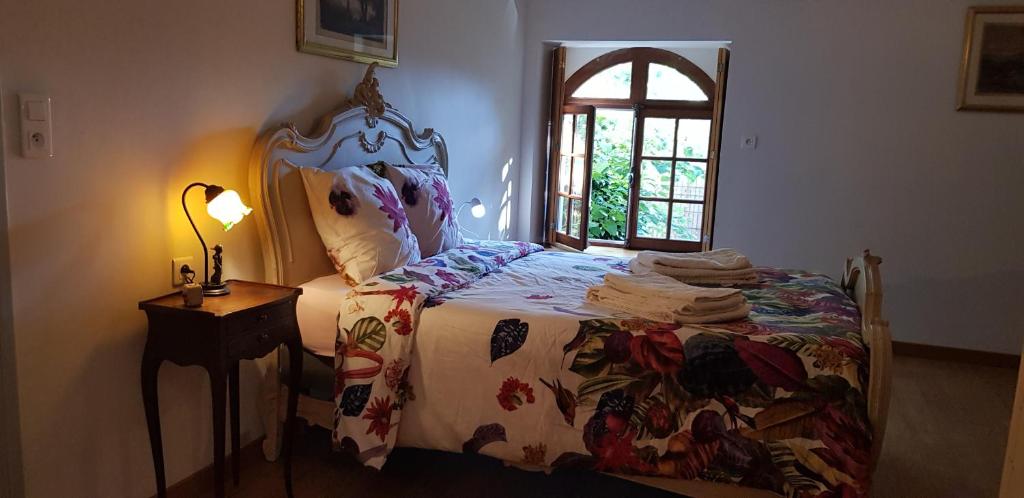 Кровать или кровати в номере Charmante maison de campagne