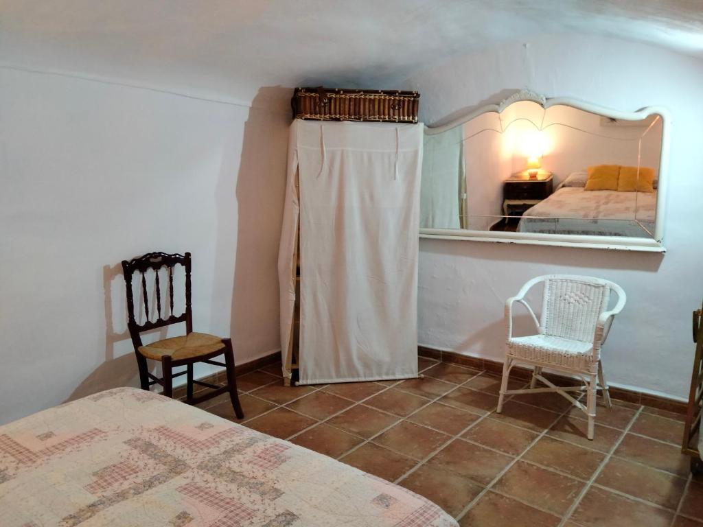 Posteľ alebo postele v izbe v ubytovaní Casa Cueva Salamandra