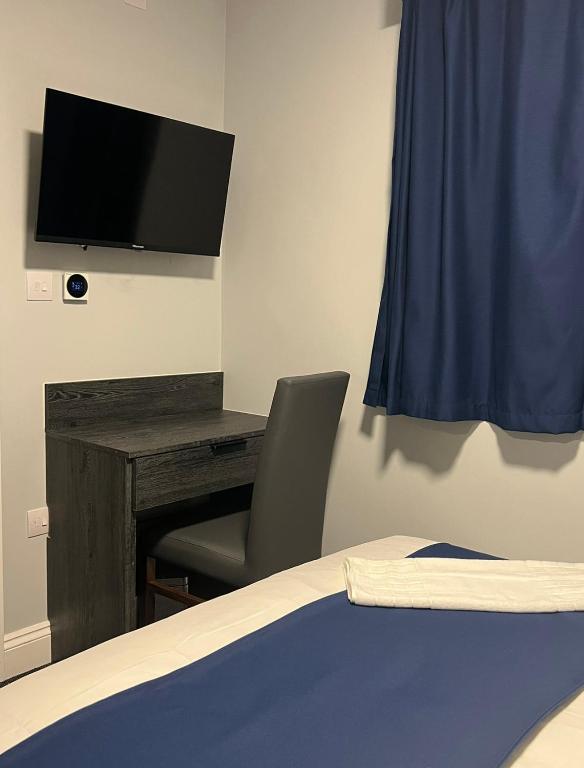 Blue Sapphire Hotel - Luxuriöses Vierbettzimmer