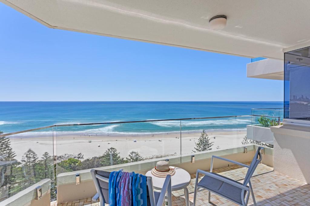 a balcony with a view of the beach at Southern Cross Beachfront Holiday Apartments in Gold Coast