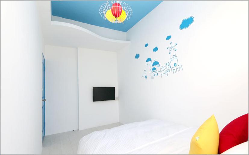 Postel nebo postele na pokoji v ubytování Chiaohsi Mediterranean Spa B&B
