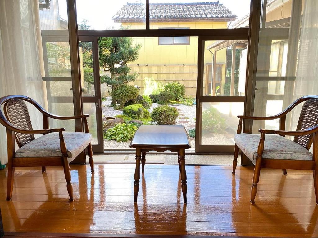 Area soggiorno di ゲストハウス山吹