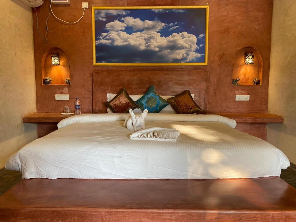 Postel nebo postele na pokoji v ubytování Chique Shanti Resort