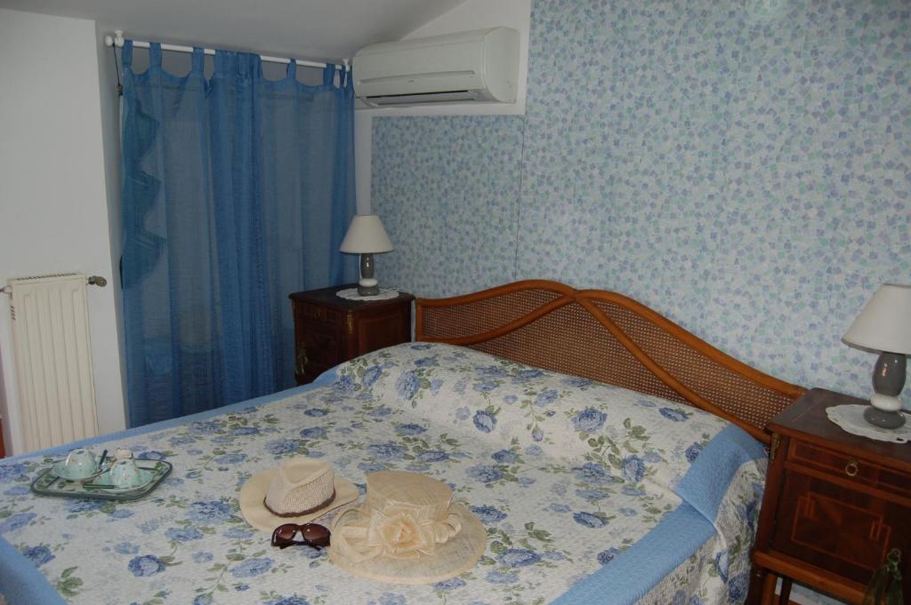 Postel nebo postele na pokoji v ubytování Le Coin Vert