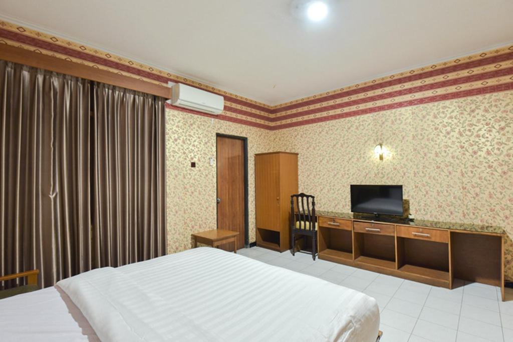 TV a/nebo společenská místnost v ubytování Sekar Ayu Hotel Malioboro Mitra RedDoorz