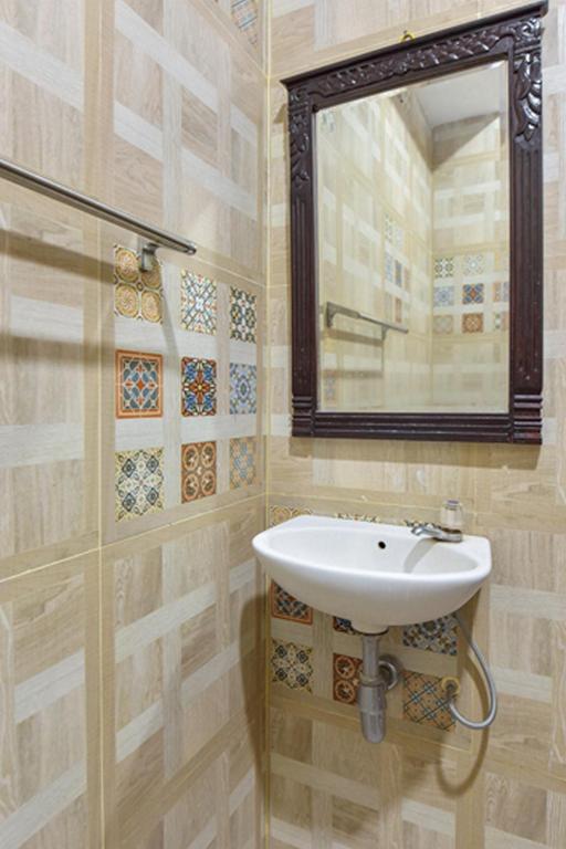Koupelna v ubytování Sekar Ayu Hotel Malioboro Mitra RedDoorz