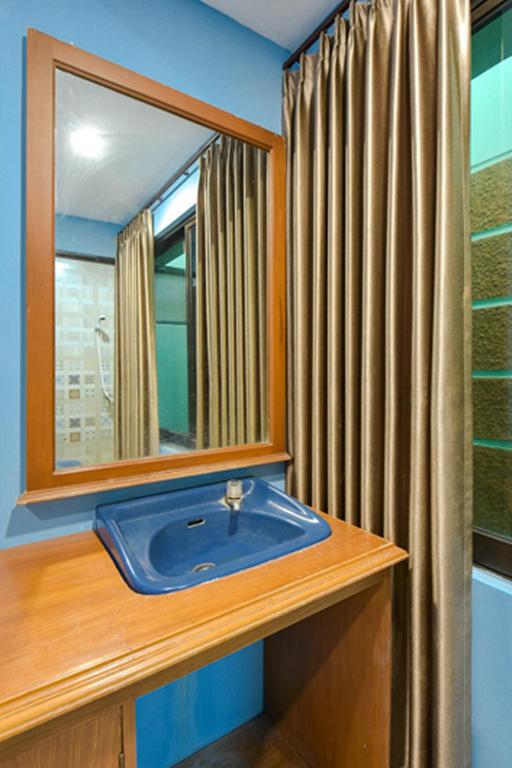 Koupelna v ubytování Sekar Ayu Hotel Malioboro Mitra RedDoorz