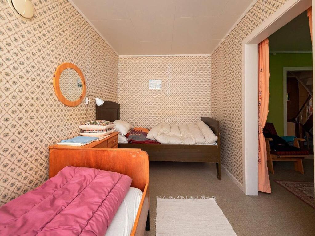 Postel nebo postele na pokoji v ubytování Holiday Home Nedre II
