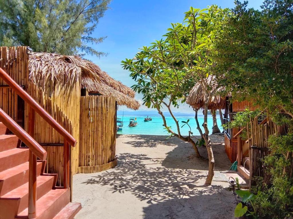 a resort with a pathway leading to the beach at Sea To Moon Lipe in Ko Lipe