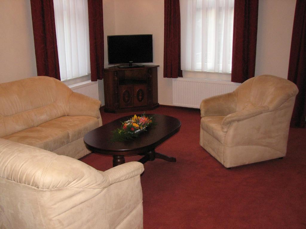Posezení v ubytování Hotel Garni Dekorahaus