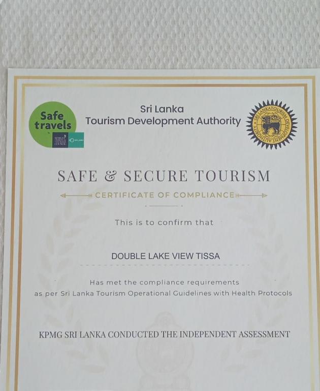 Certifikát, hodnocení, plakát nebo jiný dokument vystavený v ubytování Double Lake View Tissa & Safari