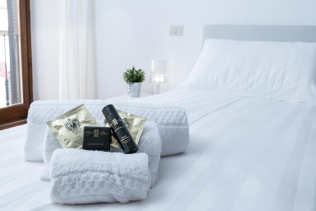Posteľ alebo postele v izbe v ubytovaní Orbitelli 15 - My Extra Home
