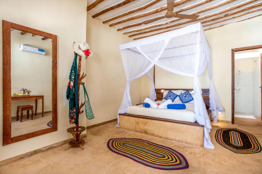 Postel nebo postele na pokoji v ubytování Marafiki Beach Hotel & SPA