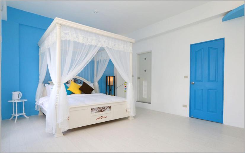Postel nebo postele na pokoji v ubytování Chiaohsi Mediterranean Spa B&B
