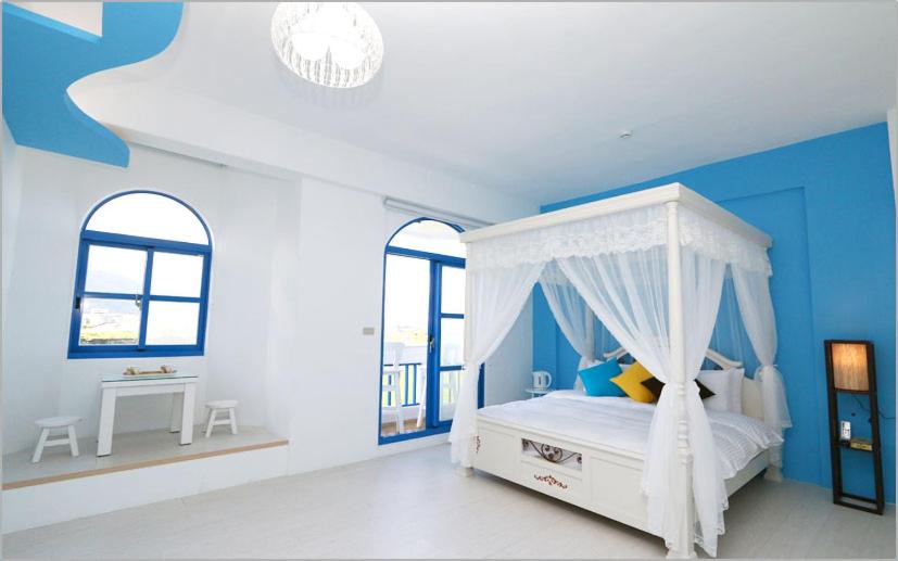 Postel nebo postele na pokoji v ubytování Chiaohsi Mediterranean Spa B&B
