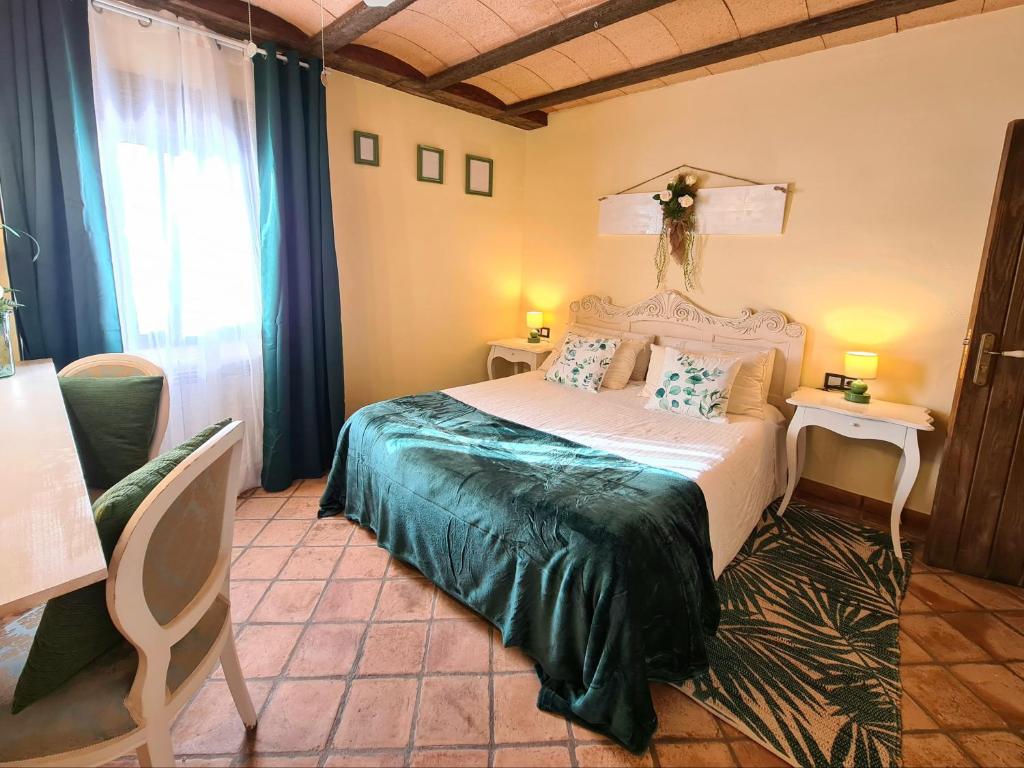 Postel nebo postele na pokoji v ubytování Hotel Rural & Spa Mas Prat