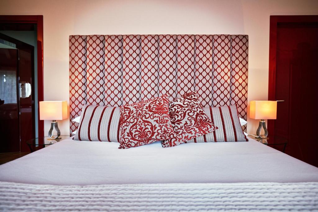 Postel nebo postele na pokoji v ubytování Villa Archi B&B