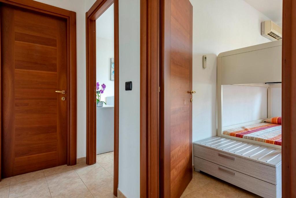 Łóżko lub łóżka w pokoju w obiekcie Egeo apartment