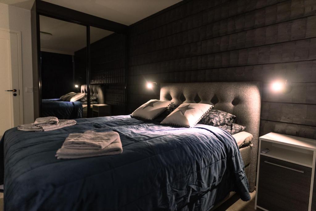 Postel nebo postele na pokoji v ubytování Apartment Rovakatu B12