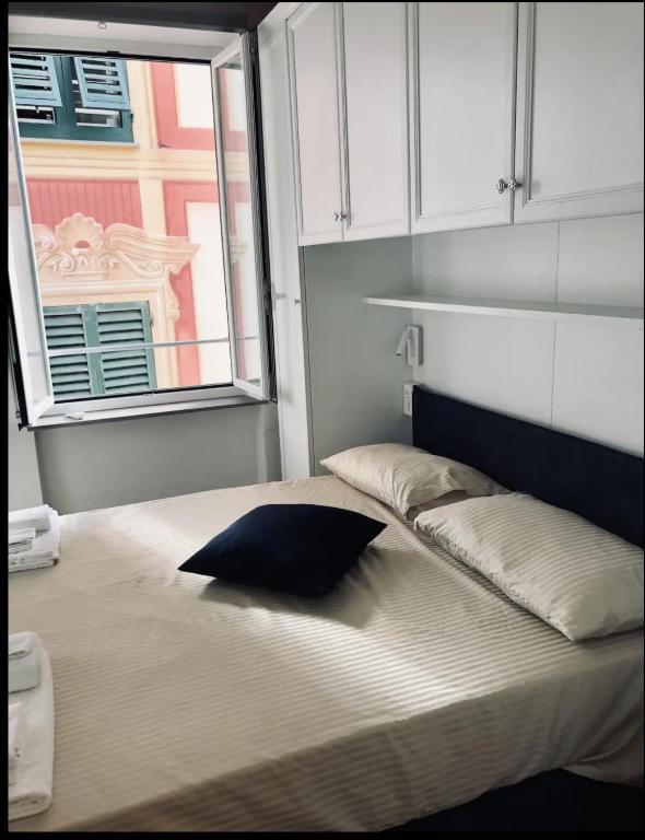 Posteľ alebo postele v izbe v ubytovaní Camogli Eden - Prestige apartment