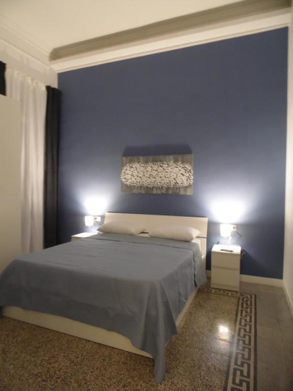 Łóżko lub łóżka w pokoju w obiekcie Chiarini22 Apartments