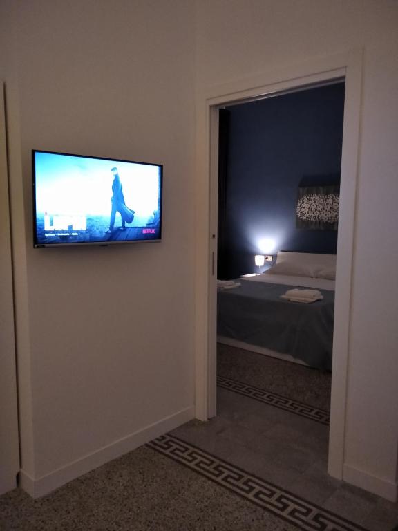 Telewizja i/lub zestaw kina domowego w obiekcie Chiarini22 Apartments
