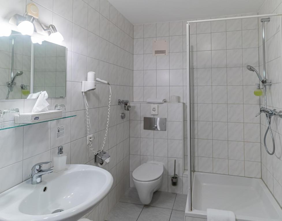 Koupelna v ubytování Altstadthotel Grauer Wolf