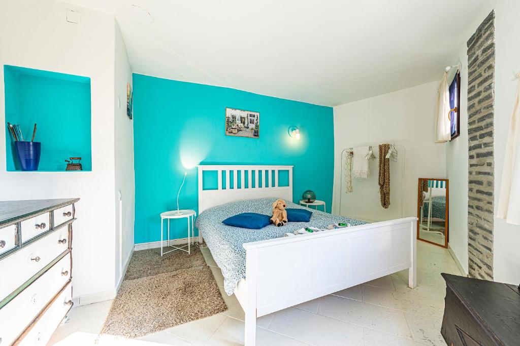 Postel nebo postele na pokoji v ubytování Casa Alma Grotto