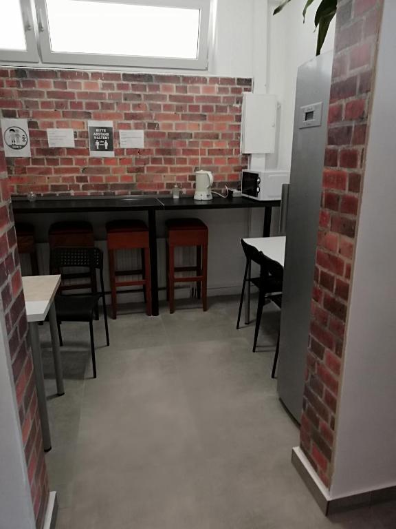 Kuchyň nebo kuchyňský kout v ubytování The Hostel