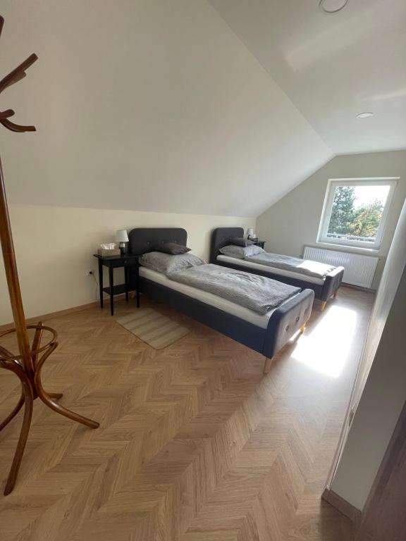 Postel nebo postele na pokoji v ubytování Koliko apartman