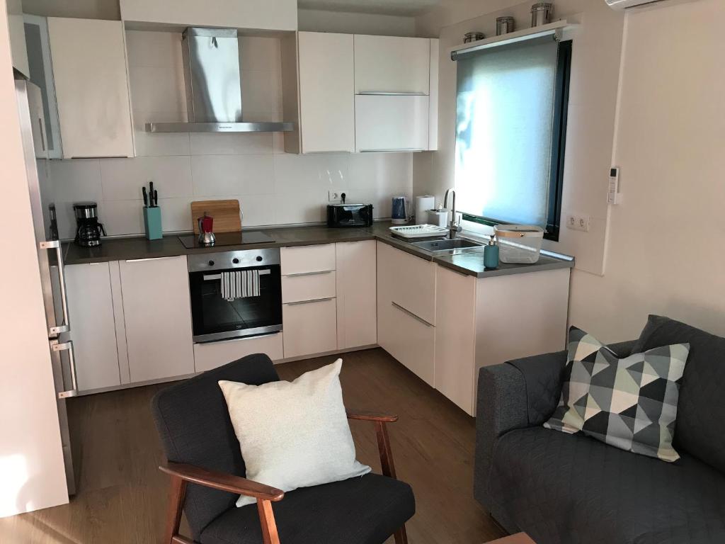 Kuchyň nebo kuchyňský kout v ubytování CASA BLANQUI