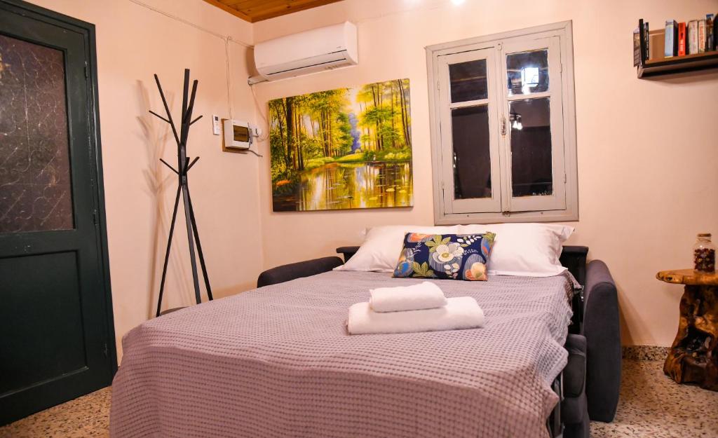 Postel nebo postele na pokoji v ubytování Sophias Cottage