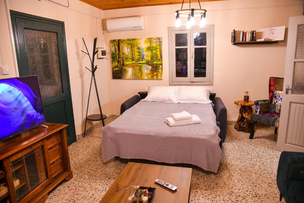 Postel nebo postele na pokoji v ubytování Sophias Cottage
