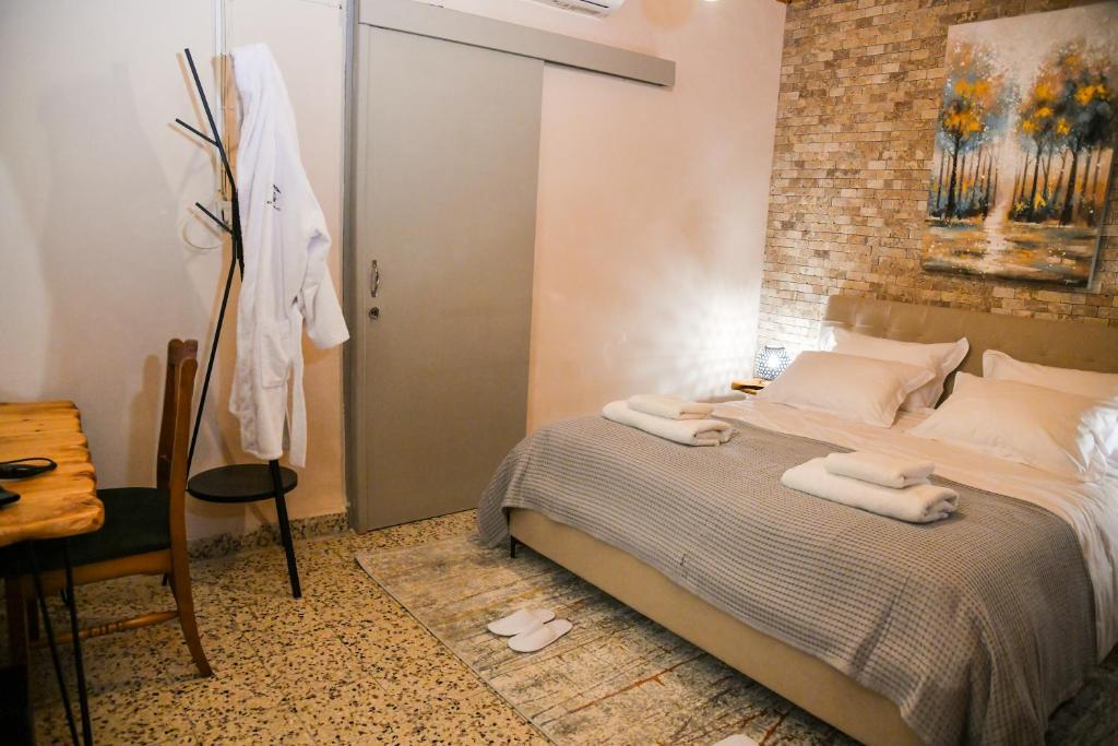 Postel nebo postele na pokoji v ubytování Sophias Cottage