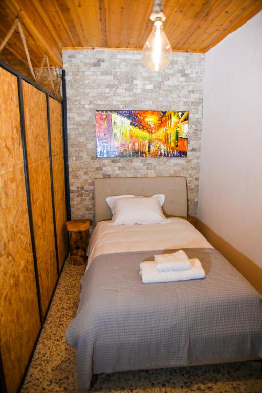 Postel nebo postele na pokoji v ubytování Sophias Cottage