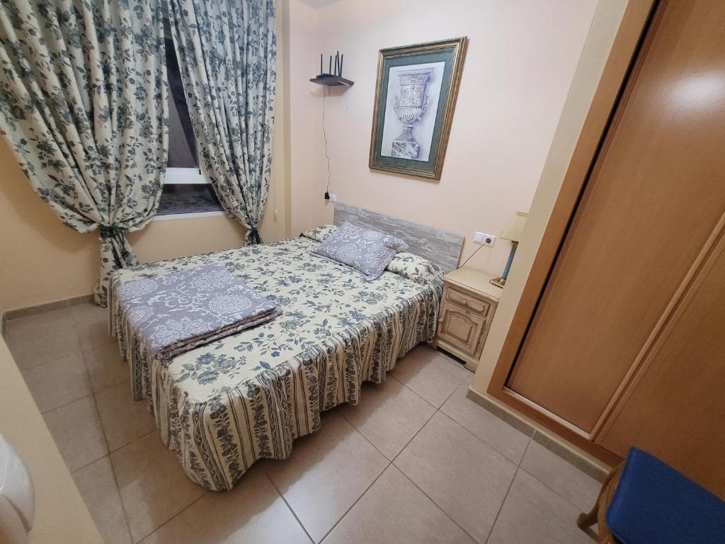 Postel nebo postele na pokoji v ubytování Apartamento vacacional Adriana , Montanejos