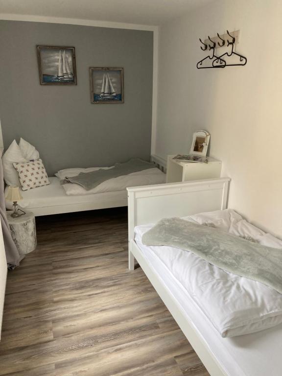 Postel nebo postele na pokoji v ubytování Guest House Dommitzsch