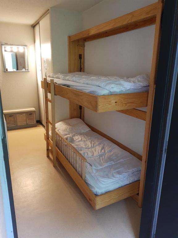 a couple of bunk beds in a room at imperatrice eugenie in Luz-Saint-Sauveur