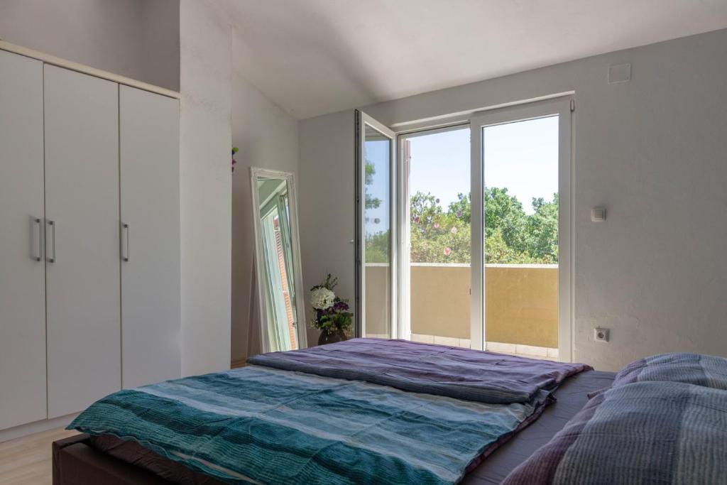 Posteľ alebo postele v izbe v ubytovaní Cozy holiday home Ella Nature with pool near the beach