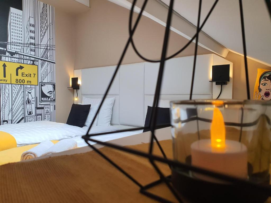 Posteľ alebo postele v izbe v ubytovaní Kaposvár Apartman