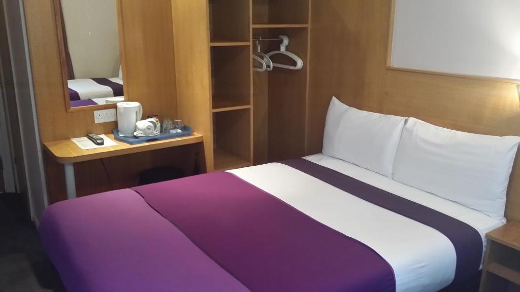 Postel nebo postele na pokoji v ubytování Arriva Hotel