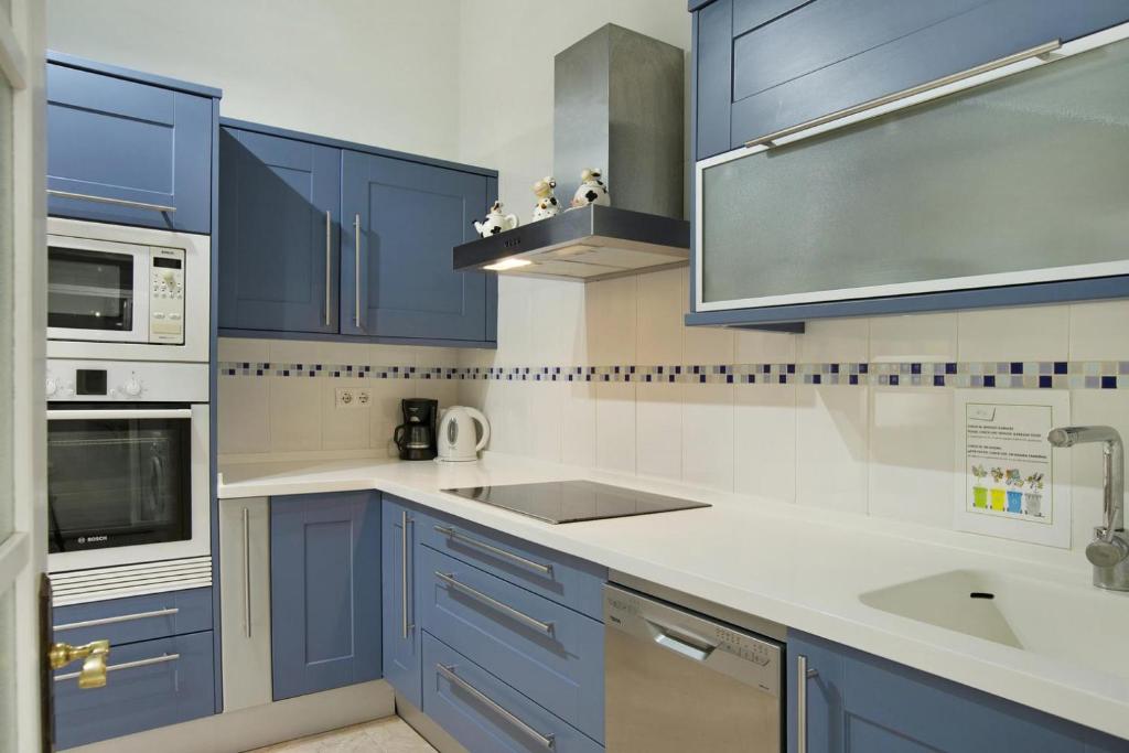 Kuchyň nebo kuchyňský kout v ubytování Vcv Apartamento Star