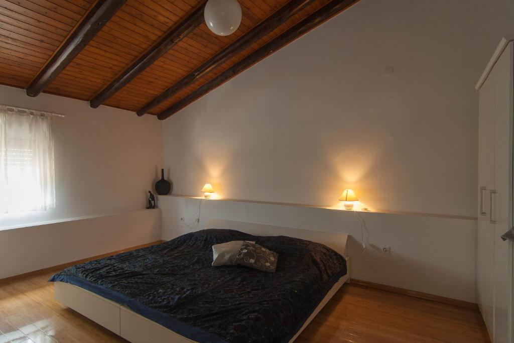 Posteľ alebo postele v izbe v ubytovaní Apartment Petra Pekica