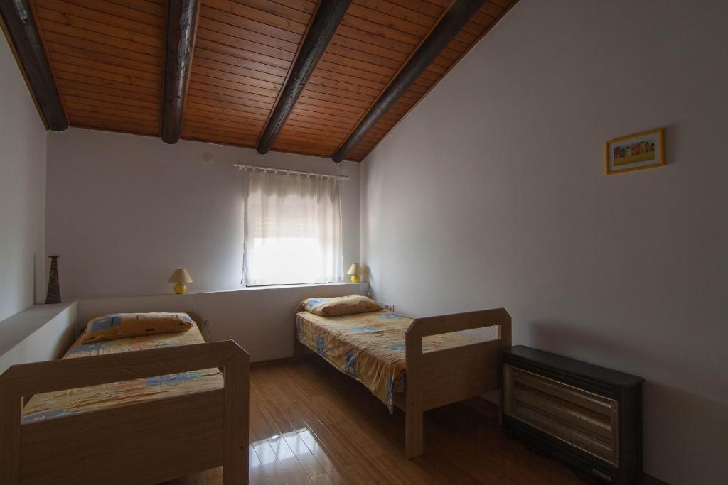 Posteľ alebo postele v izbe v ubytovaní Apartment Petra Pekica