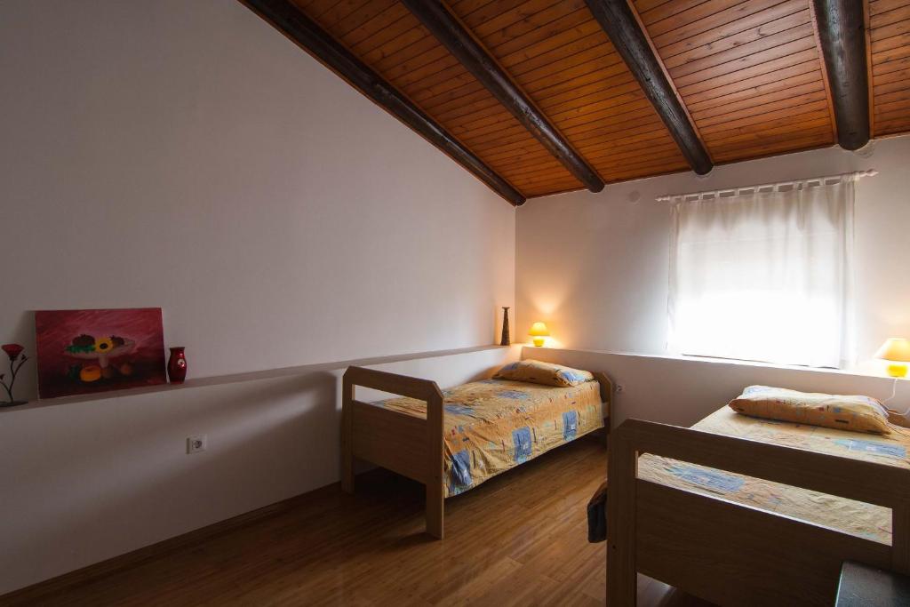 Posteľ alebo postele v izbe v ubytovaní Apartment Petra Pekica