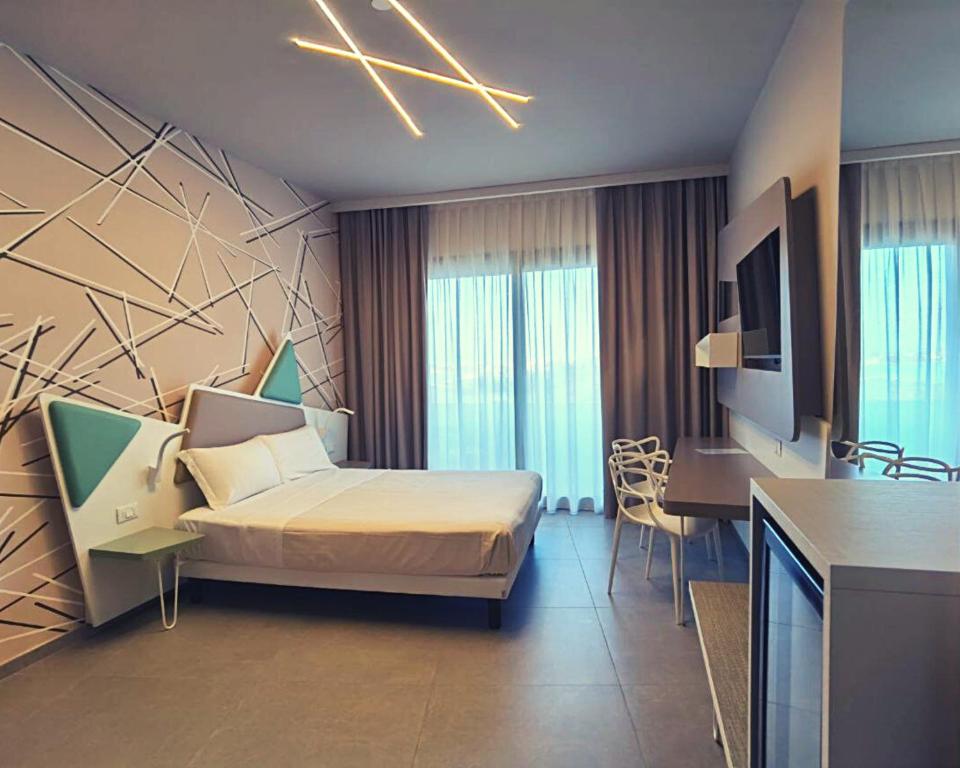 Posteľ alebo postele v izbe v ubytovaní Saracen Sands Hotel & Congress Centre - Palermo