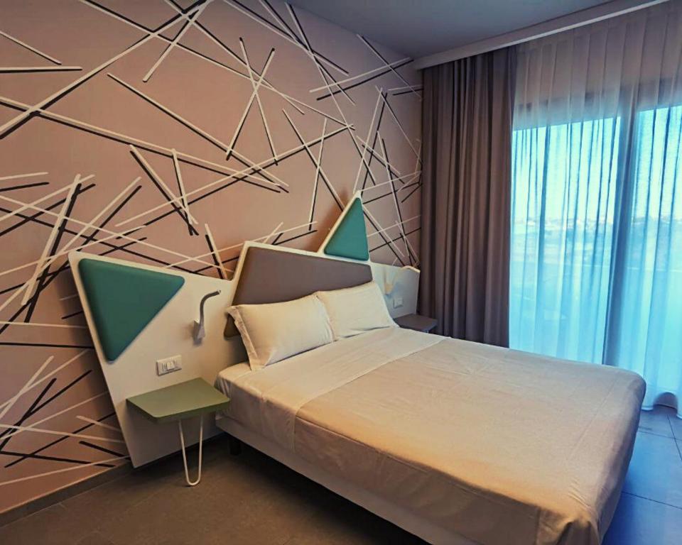 Posteľ alebo postele v izbe v ubytovaní Saracen Sands Hotel & Congress Centre - Palermo