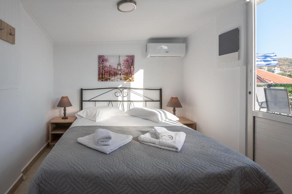 Posteľ alebo postele v izbe v ubytovaní Calliope Rooms