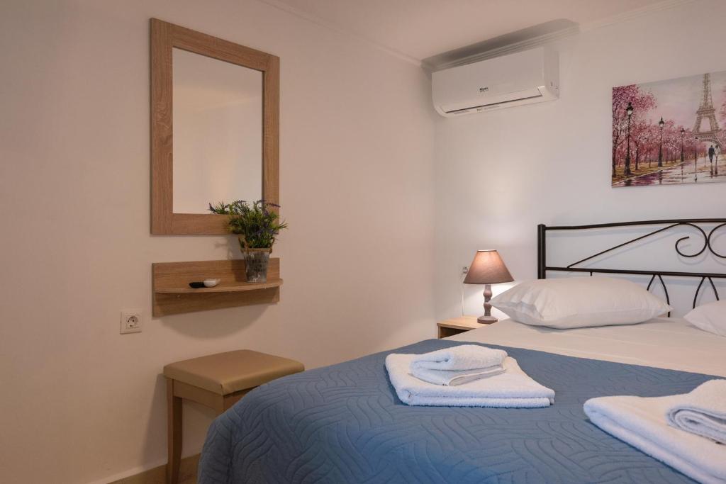 Posteľ alebo postele v izbe v ubytovaní Calliope Rooms